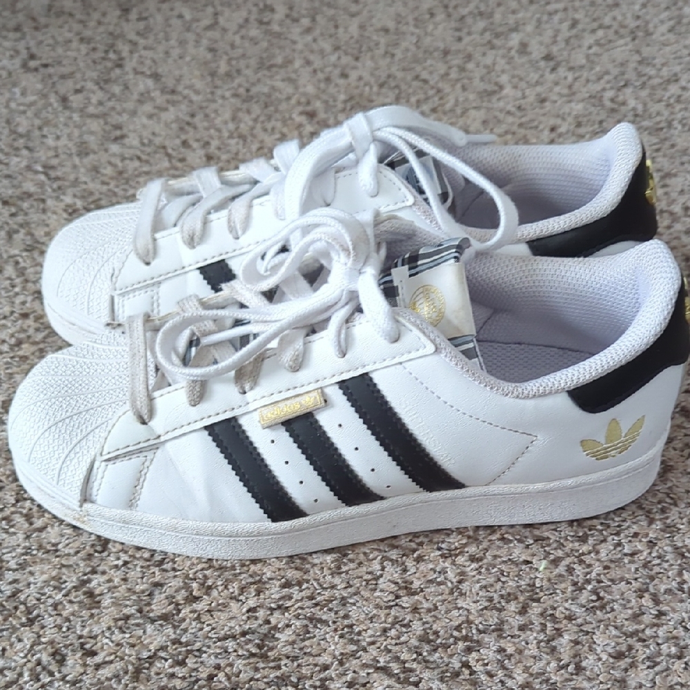 Adidas Superstar White with Black Stripes and Gold Accents